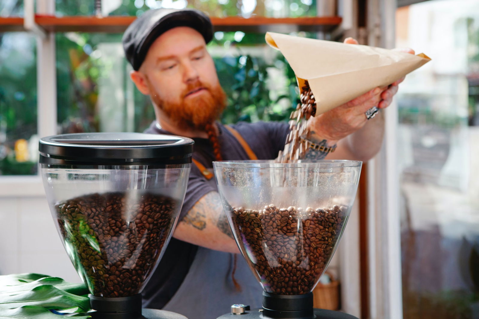 Byron Bay barista pouring locally produced coffee beans